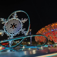 The Olympic cauldron, designed in the shape of a snowflake, is displayed outside Beijing\'s National Stadium following the Feb. 4 opening ceremony of the 2022 Winter Olympics. | POOL / VIA AFP-JIJI