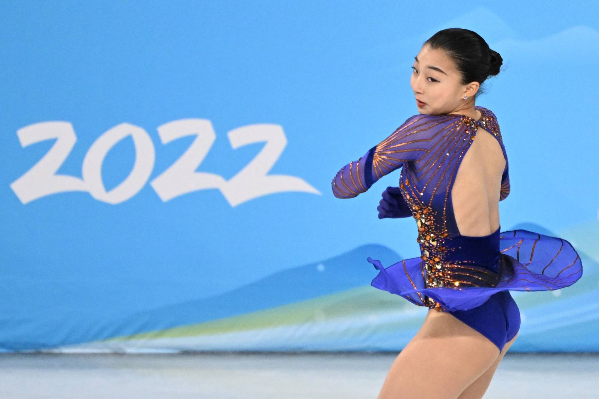 Kaori Sakamoto performs her long program in the women's singles competition at Beijing's Capital Indoor Stadium on Thursday. | AFP-Jiji