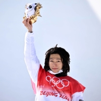 Snowboarder Ayumu Hirano became the first Japanese athlete to win a medal at three straight Winter Olympics with his men\'s halfpipe triumph. | AFP-JIJI