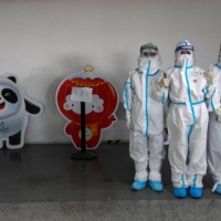 Participants in the Beijing Olympics entered a secure \"closed loop,\" where they were tested daily and completely isolated from the general population. | REUTERS