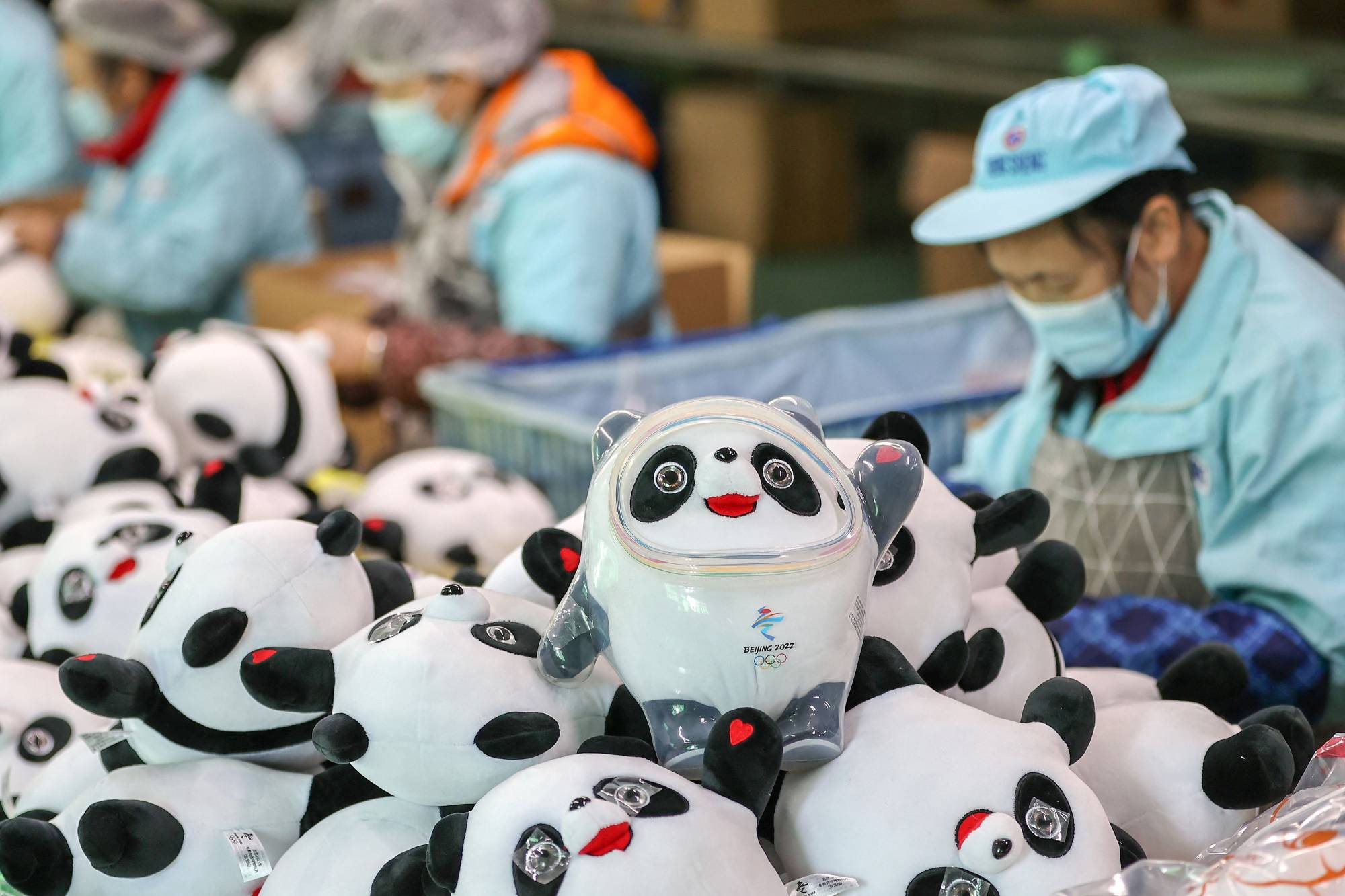 The popularity of Beijing 2022 mascot Bing Dwen Dwen sparked a run on merchandise, leading to shortages across China. | AFP-Jiji