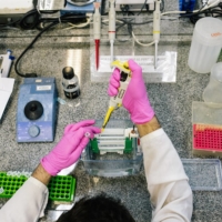 Scientists say most COVID-19 vaccines are designed to produce antibodies that attack just one part of the virus — the spike protein. As that protein keeps mutating, vaccines lose their effectiveness. | BLOOMBERG