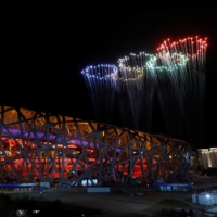 Fireworks explode over the National Stadium at the end of the closing ceremony of the Beijing 2022 Winter Olympics on Sunday. | REUTERS