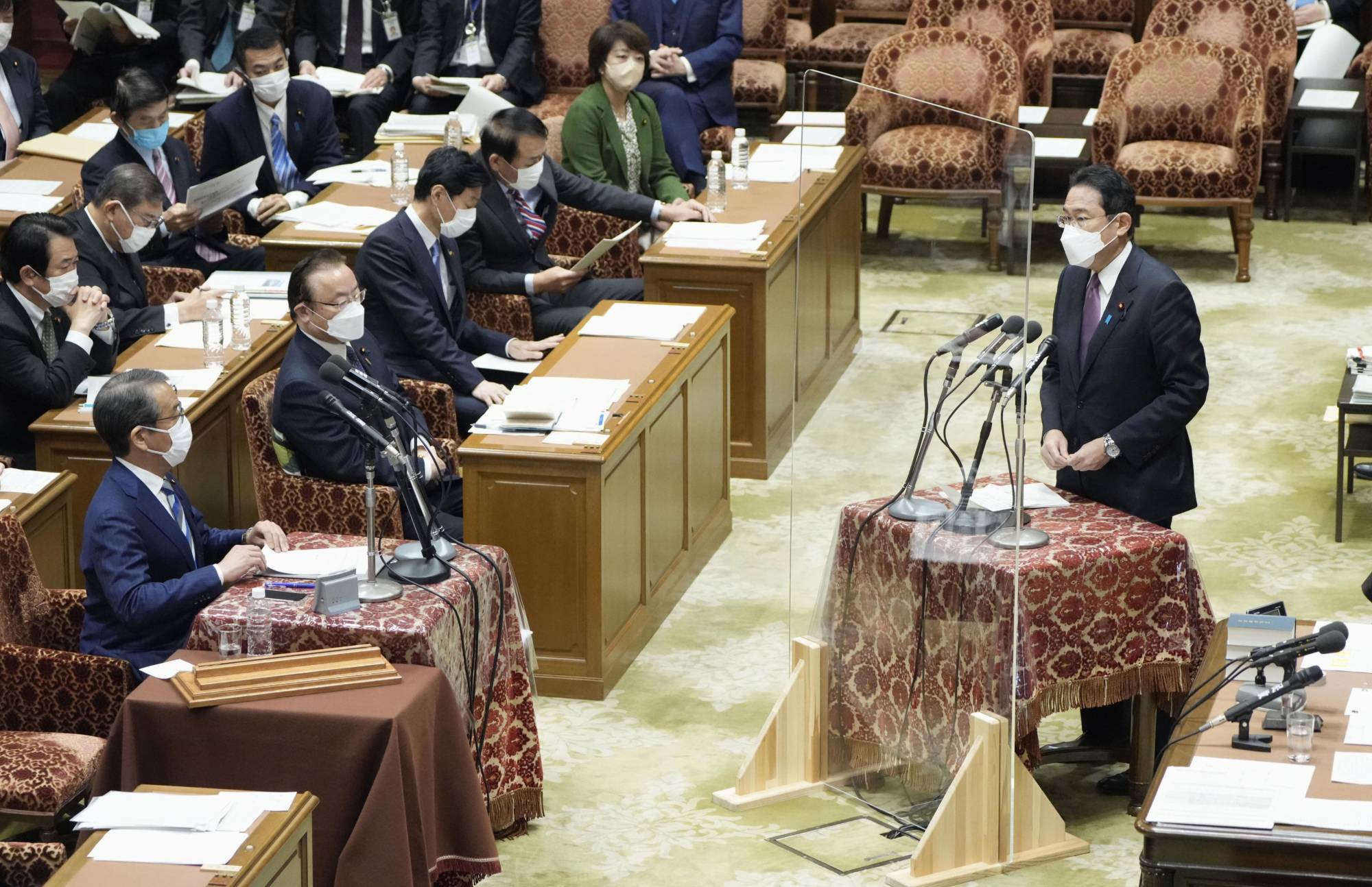 Prime Minister Fumio Kishida speaks in parliament on Monday. | KYODO