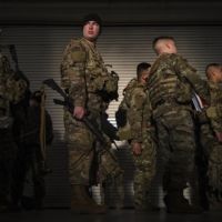U.S. Army soldiers before their deployment to Eastern Europe, at Fort Bragg, North Carolina, on Feb. 14. Nearly 5,000 soldiers from the 82nd Airborne Division are now in Poland in response to the Russian deployments on Ukraine\'s borders. | KENNY HOLSTON / THE NEW YORK TIMES