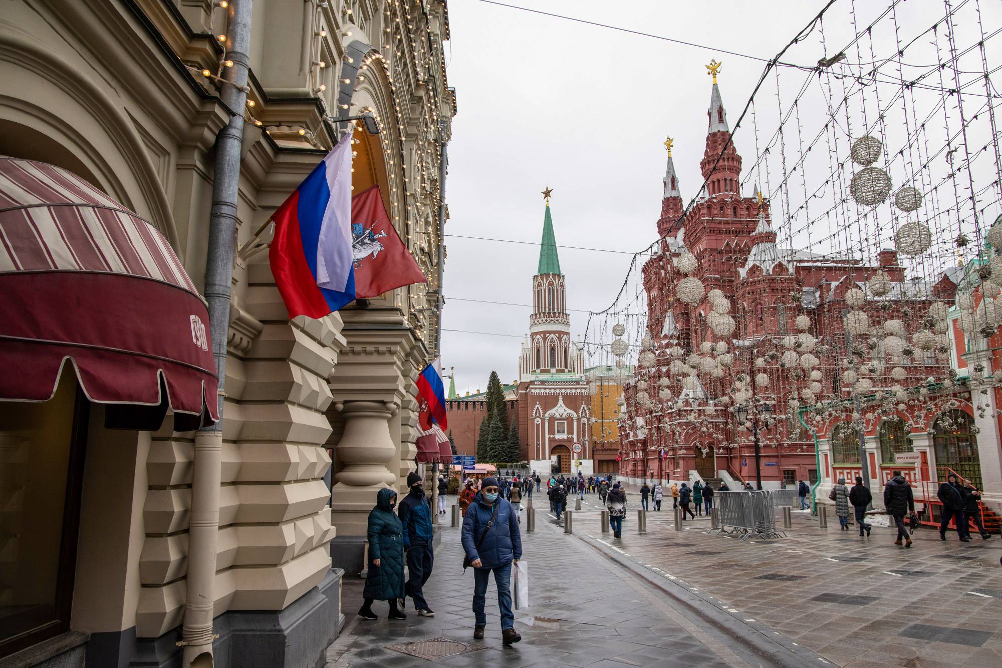 Shoppers in Moscow on Wednesday. U.S. President Joe Biden's debut set of sanctions on Russia for its actions over disputed Ukrainian territory hit markets with a whimper and were quickly criticized as being limited in scope. | Bloomberg