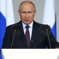 President Vladimir Putin delivers a speech during the opening ceremony of the International Military-Technical Forum \"Army-2021\" in Kubinka outside Moscow in August 2021. | AFP-JIJI