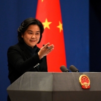 Chinese Foreign Ministry spokesperson Hua Chunying at the daily news conference at the Foreign Ministry in Beijing on Thursday. | AFP-JIJI