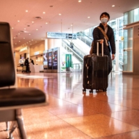 On Thursday, the government released details of eased border restrictions from March following Prime Minister Fumio Kishida’s move last week to allow new entries of nontourist foreign nationals. | AFP-JIJI