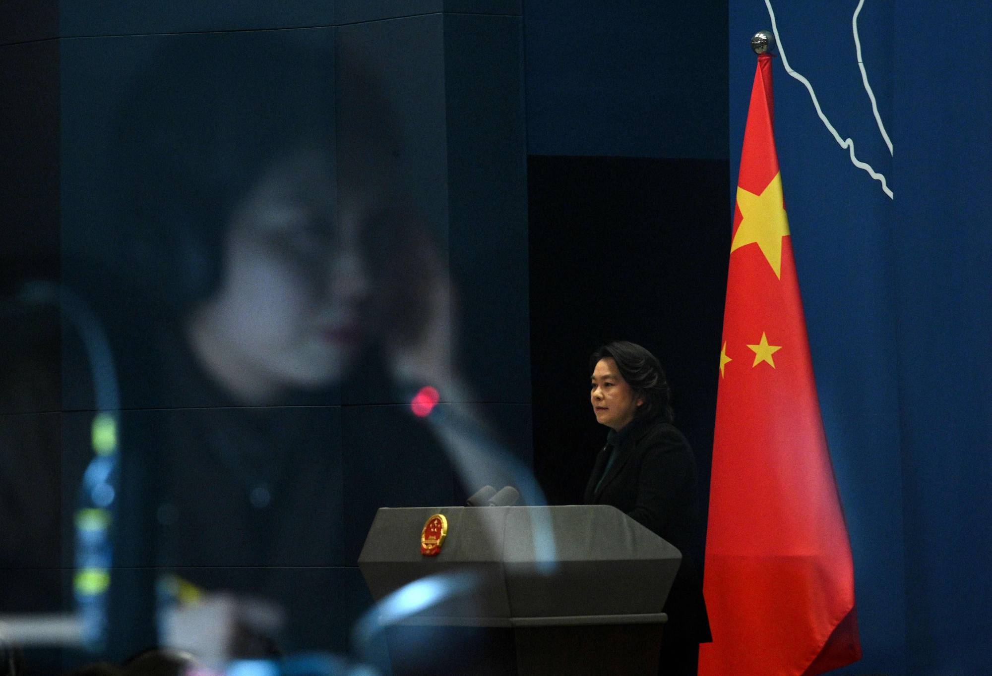Chinese Foreign Ministry spokesperson Hua Chunying answers questions during a daily news conference at the Foreign Ministry in Beijing on Thursday. | AFP-JIJI