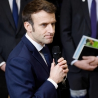 France President Emmanuel Macron delivers a speech in Paris on Feb. 26.  | POOL / VIA AFP-JIJI
