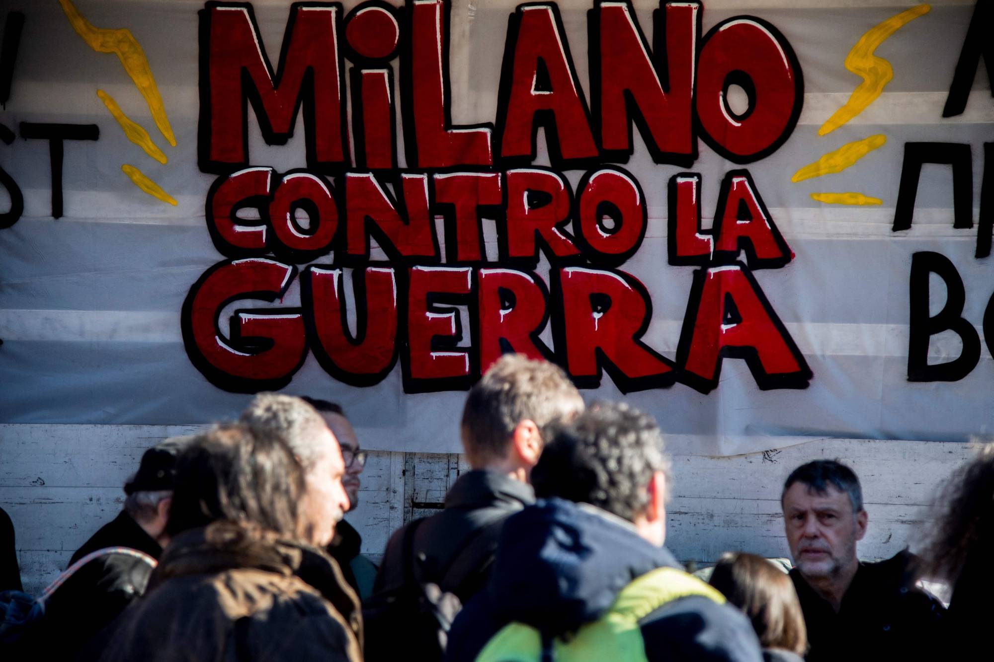 People take part in a demonstration against Russia's invasion of Ukraine in Milan on Saturday.  | AFP-JIJI