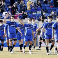 Wild Knights players celebrate after their win over Sungoliath in Kumagaya, Saitama Prefecture, on Saturday. | KYODO