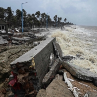 Waves lash over onto a damaged shoreline in May 2021 after Cyclone Yaas hit India\'s eastern coast in the Bay of Bengal, at a beach in Shankarpur. | AFP-JIJI