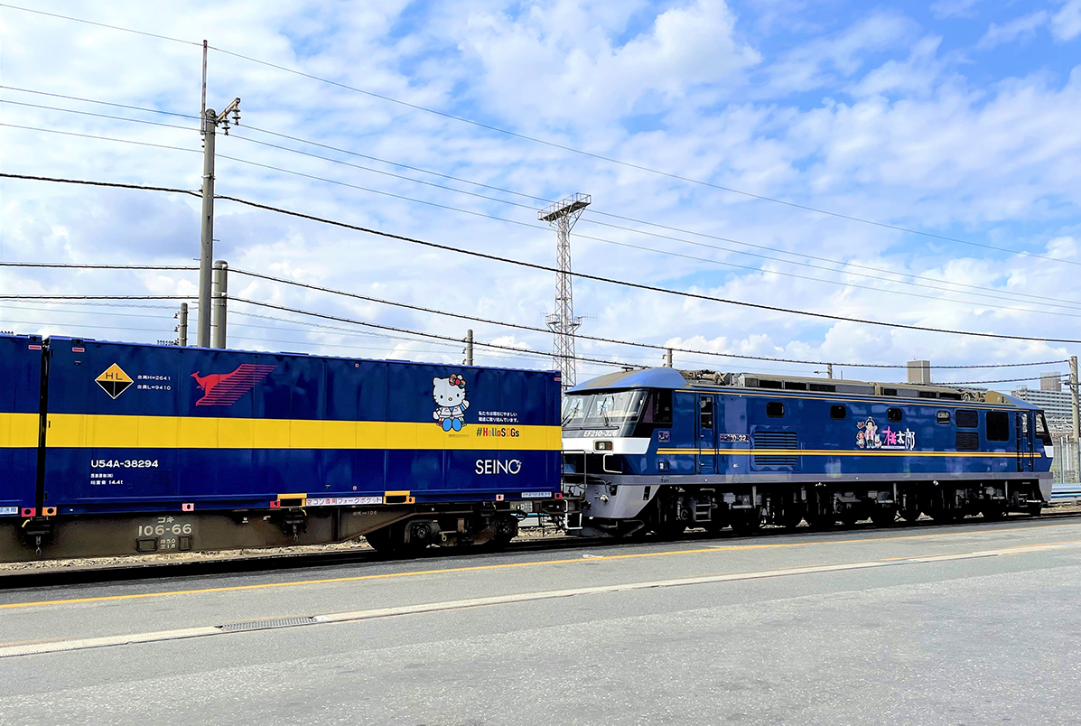 A shipping container decorated with a Hello Kitty design is transported on a Seino Holdings freight train. | SEINO HOLDINGS
