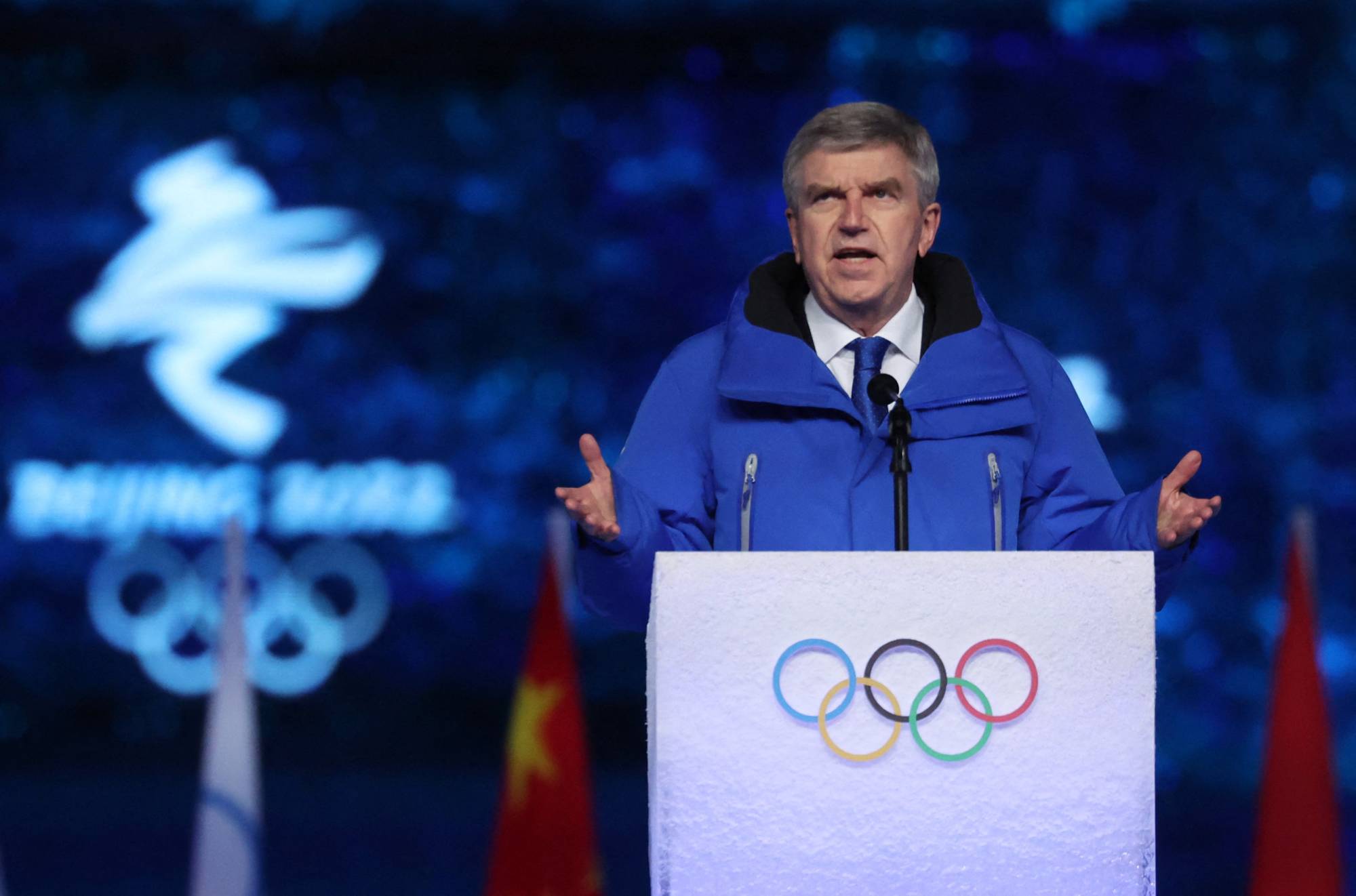 IOC President Thomas Bach speaks at the closing ceremony of the Beijing Olympics on Feb. 20. | REUTERS