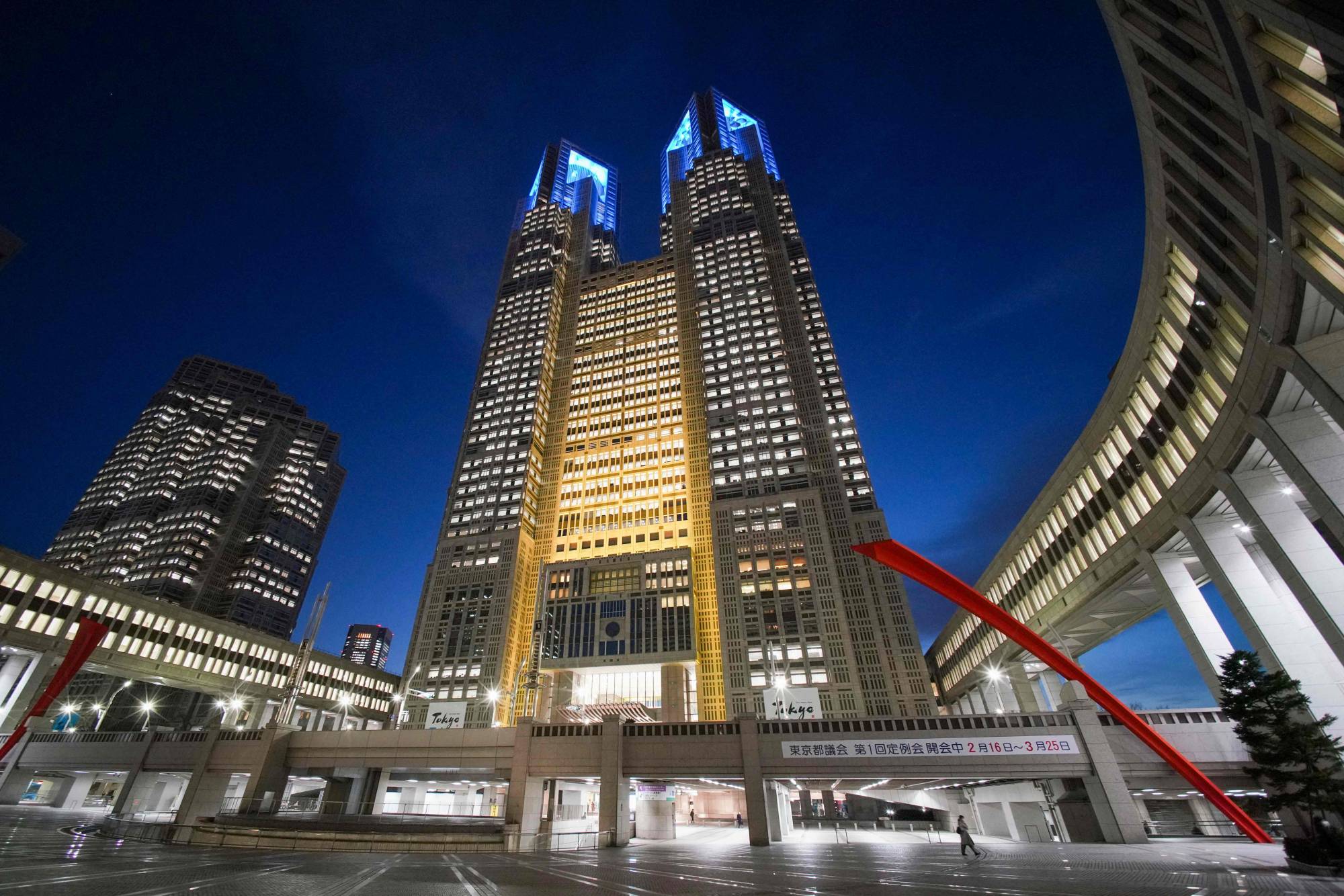 The Tokyo Metropolitan Government building is lit up in the colors of the Ukrainian flag on Monday. | AFP-JIJI