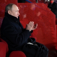 Russian President Vladimir Putin attends the opening ceremony of the 2022 Beijing Olympic Winter Games in Beijing on Feb. 4. | SPUTNIK / KREMLIN / VIA REUTERS