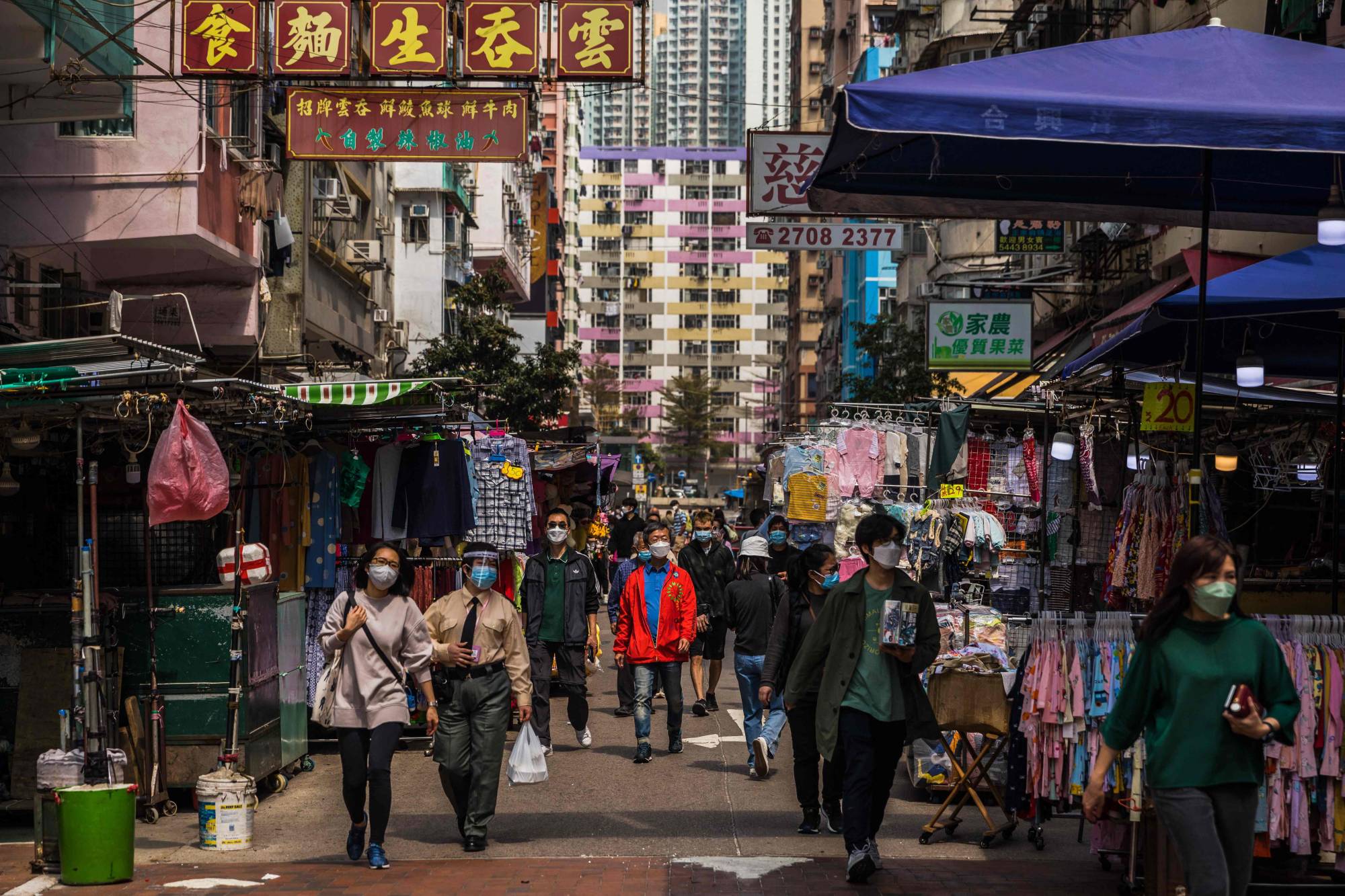 The large outbreak of COVID-19 infections in Hong Kong may signal a continuation of Beijing's strict 