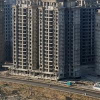 Buildings developed by China Evergrande Group that authorities have issued demolition orders for in Danzhou, China, on Jan. 6. | REUTERS