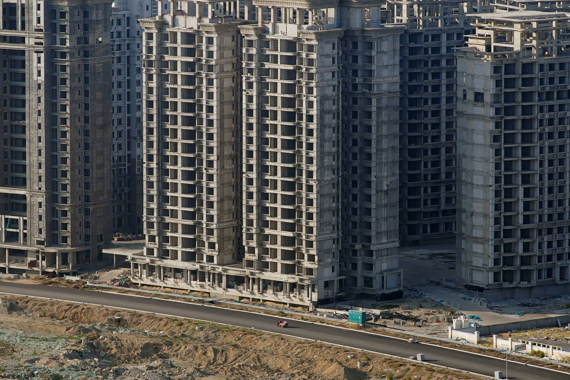 Buildings developed by China Evergrande Group that authorities have issued demolition orders for in Danzhou, China, on Jan. 6. | REUTERS