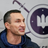 Wladimir Klitschko speaks with journalists in Kyiv, on Feb. 2 | REUTERS
