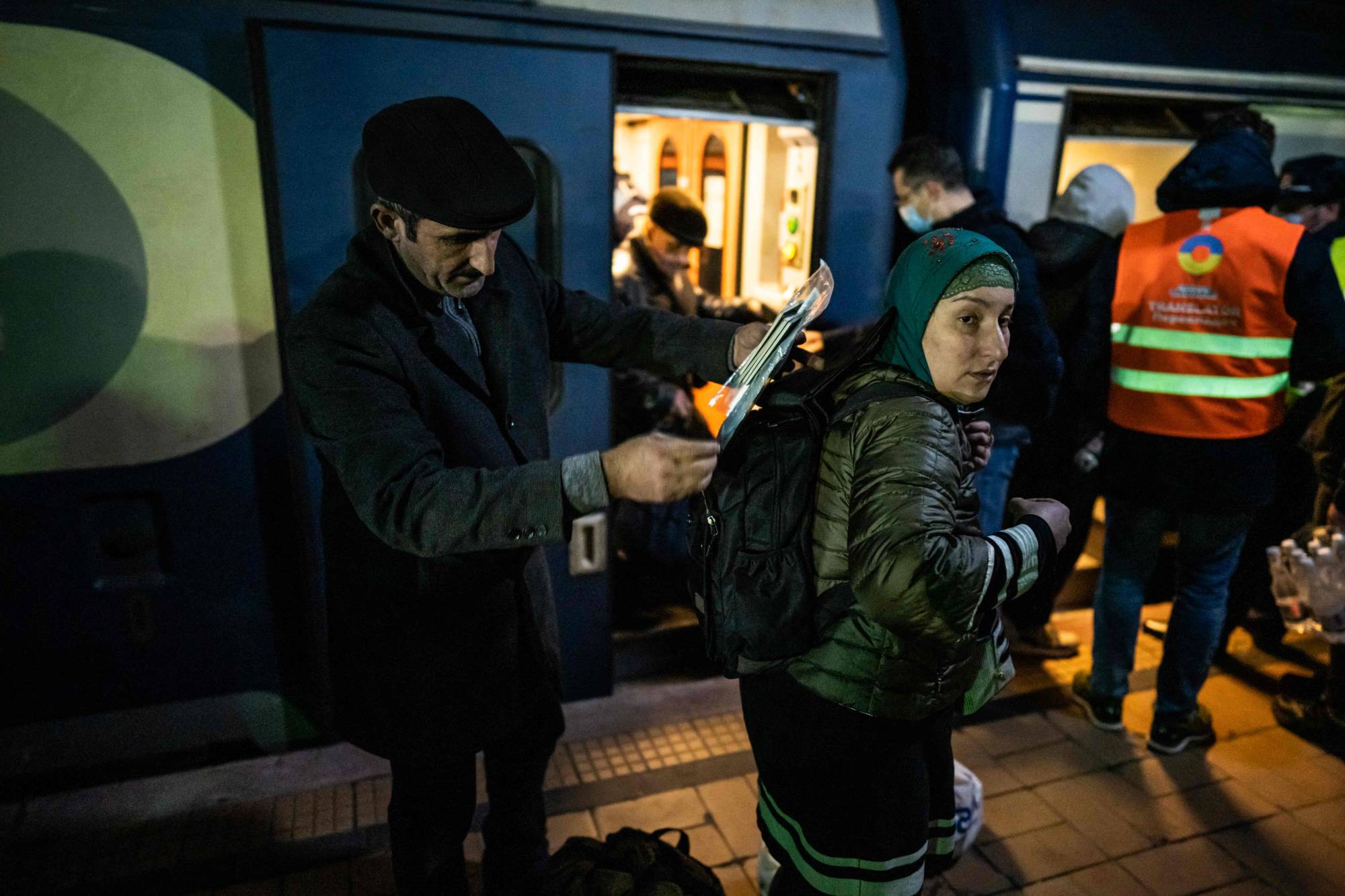 Refugees coming from Ukraine arrive at the North Railway Station in Bucharest on Friday. | AFP-JIJI