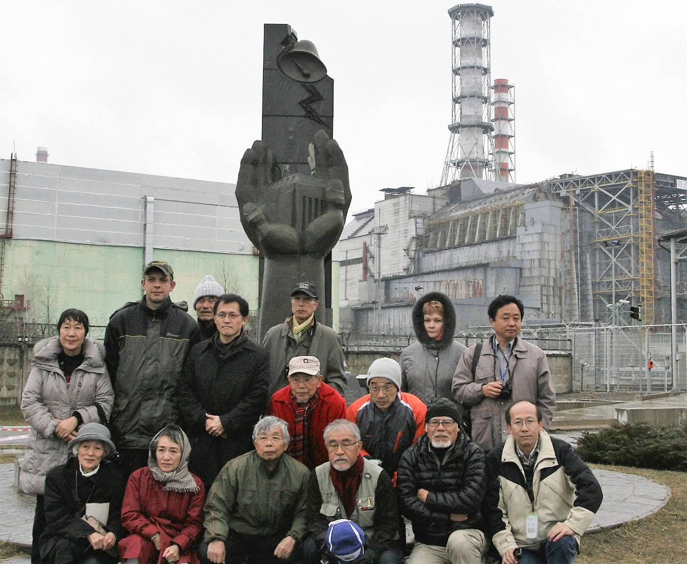 Hibakusha Toshiko Tanaka (back, far left) visits the Chernobyl nuclear plant with other A-bomb survivors in April 2012. | KYODO