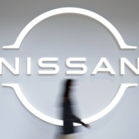 Nissan Motor Co. said it has decided not to appeal a Tokyo District Court ruling that found the automaker guilty for its role in underreporting former Chairman Carlos Ghosn’s compensation. | BLOOMBERG