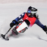 Japan\'s Momoka Muraoka participates in the women\'s downhill sit skiing event at the National Alpine Skiing Center on Saturday. | REUTERS