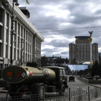 A military vehicle drives through Maidan square in Kyiv on Feb. 27. | AFP-JIJI