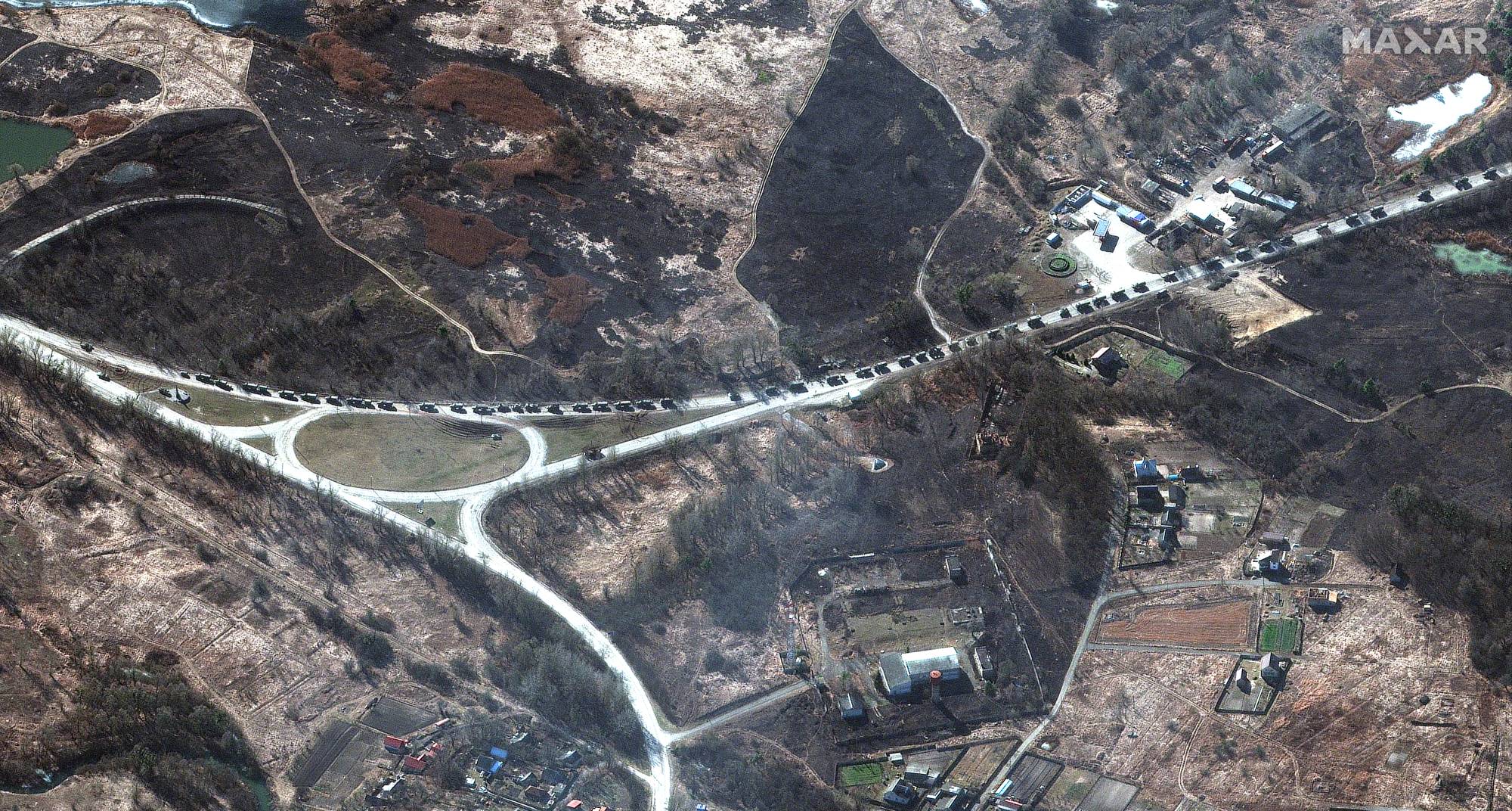 A Russian military convoy northwest of Kyiv in a satellite photo released Feb. 28.  | MAXAR TECHNOLOGIES / VIA THE NEW YORK TIMES