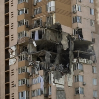 Damage from a Russian missile in Kyiv on Feb. 26.  | LYNSEY ADDARIO / THE NEW YORK TIMES