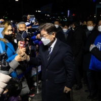 Lee Jae-myung during a campaign rally in Seoul on Feb. 15. | BLOOMBERG