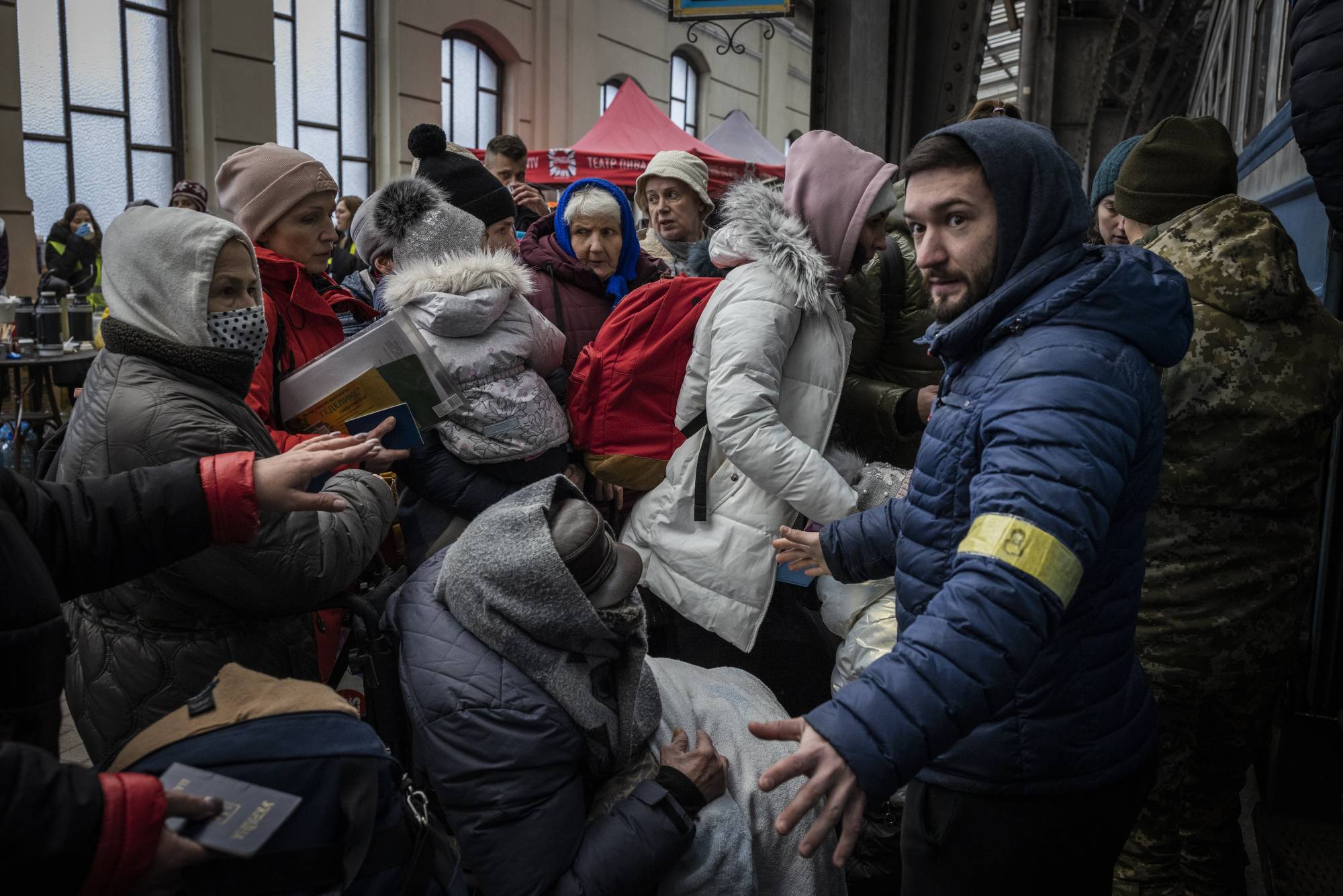 Thousands of Ukrainians are fleeing their homeland to seek refuge in neighboring countries to the west. | Ivor Prickett/The New York Times