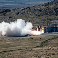 The U.S. Navy, in collaboration with the U.S. Army, conducts a static fire test of the first stage of a hypersonic missile in Promontory, Utah, in October. | NORTHROP GRUMMAN / VIA REUTERS