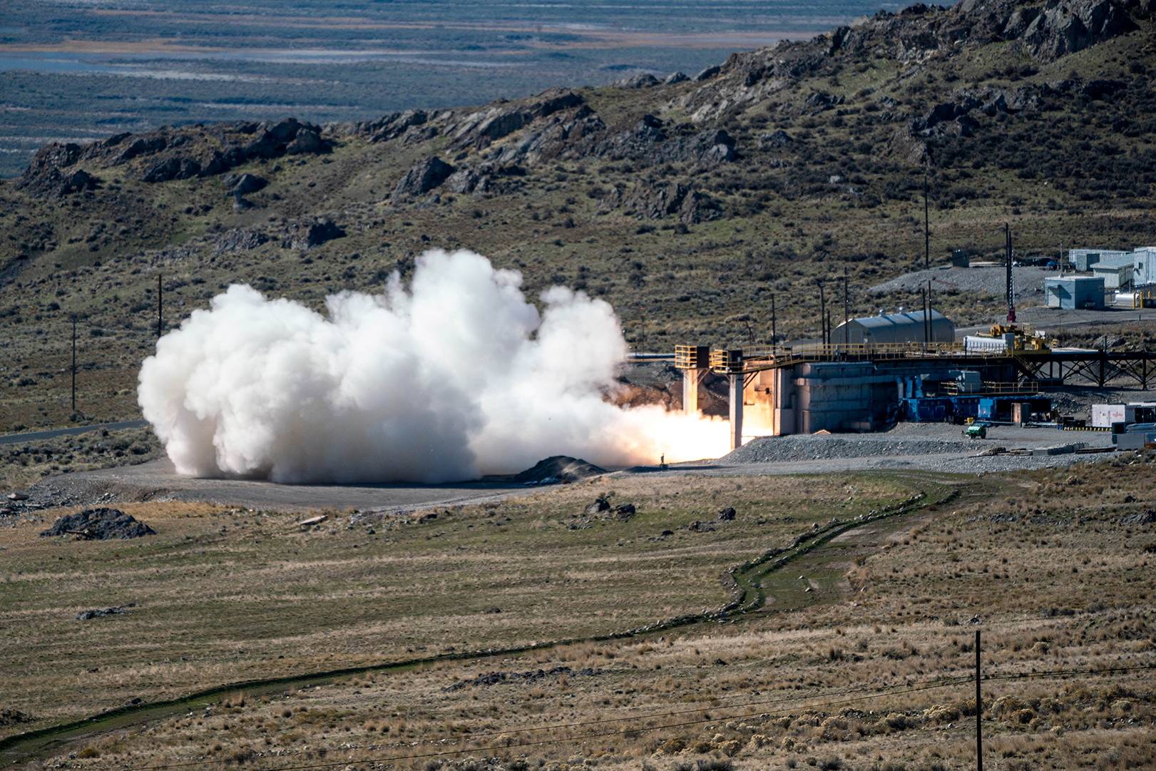 The U.S. Navy, in collaboration with the U.S. Army, conducts a static fire test of the first stage of a hypersonic missile in Promontory, Utah, in October. | Northrop Grumman / via REUTERS