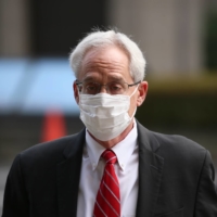 Greg Kelly, former representative director of Nissan Motor Co., appears at the Tokyo District Court on Thursday. | POOL / VIA BLOOMBERG