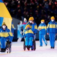 Ukraine\'s delegation participates in the opening ceremony of the Beijing Paralympics at the National Stadium on Friday. | REUTERS