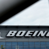 The Boeing regional headquarters in Arlington, Virginia. Boeing said Monday that it will no longer buy titanium from Russia and will instead rely on inventories and alternative suppliers for airplane production. | AFP-JIJI