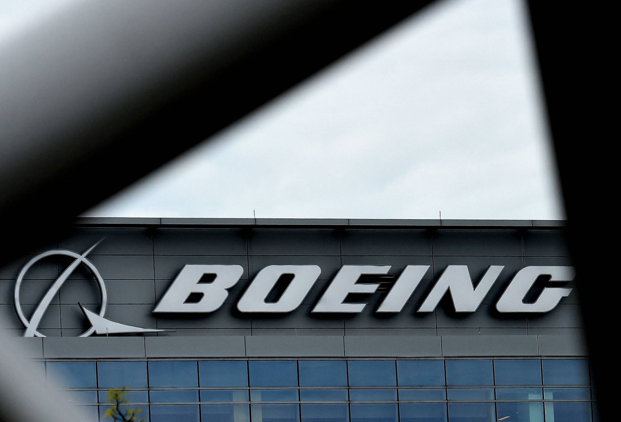 The Boeing regional headquarters in Arlington, Virginia. Boeing said Monday that it will no longer buy titanium from Russia and will instead rely on inventories and alternative suppliers for airplane production. | AFP-JIJI