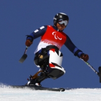 Taiki Morii competes in the men\'s super-G race during the Beijing Paralympics in Yanqing, China, on Sunday. | REUTERS
