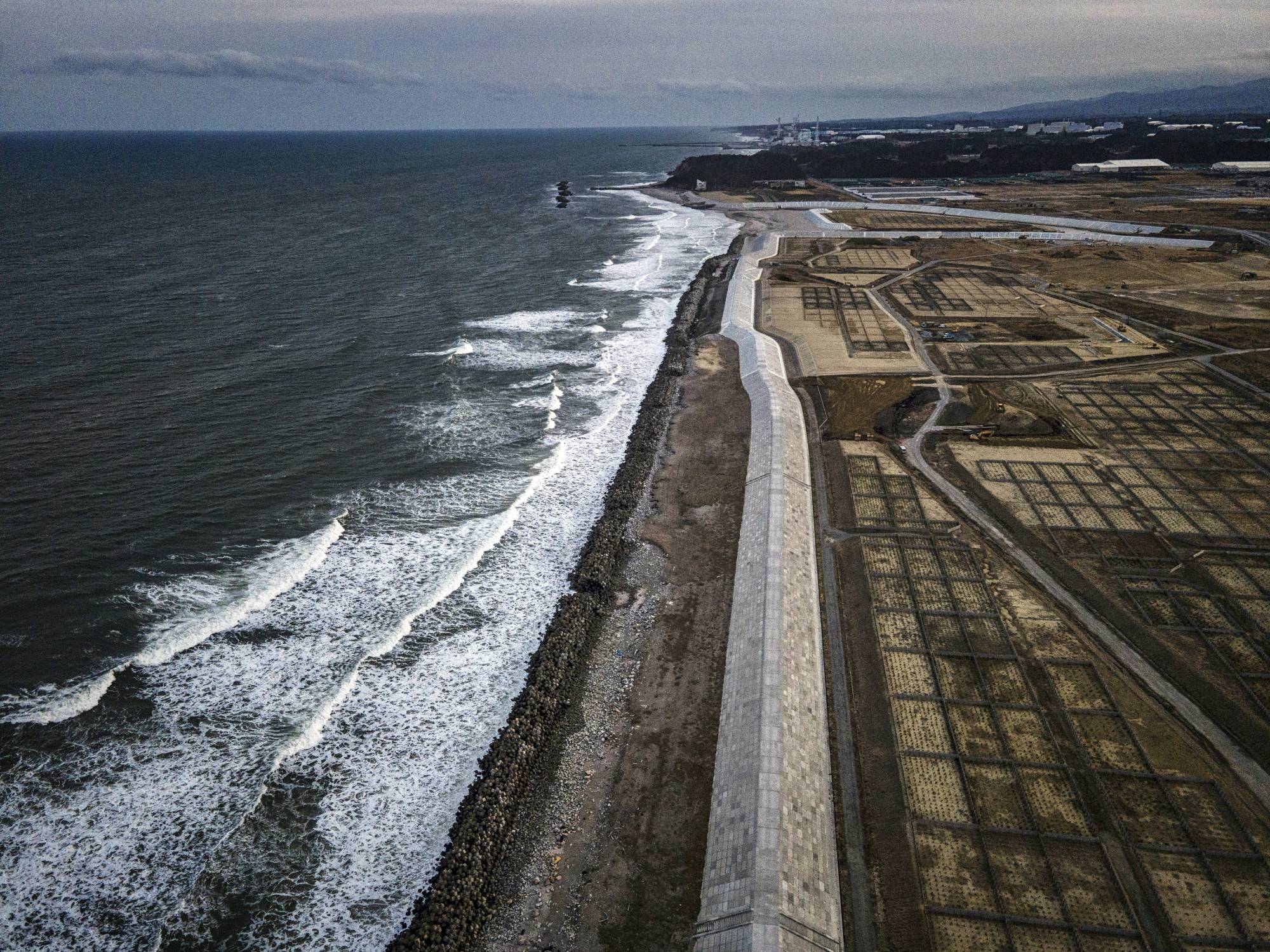 Part of a roughly 245-mile (394 kilometer) sea wall near the Fukushima Daiichi nuclear power plant in Fukushima Prefecture, Japan, on March 4, 2021. The structure is designed to protect against future tsunamis. | James Whitlow Delano / The New York Times