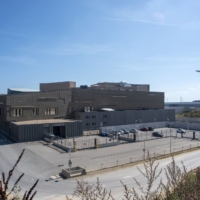 A cargo plane comes in to land at Luxembourg Airport beside the Le Freeport tax-free storage complex in Luxembourg in August 2019. | BLOOMBERG