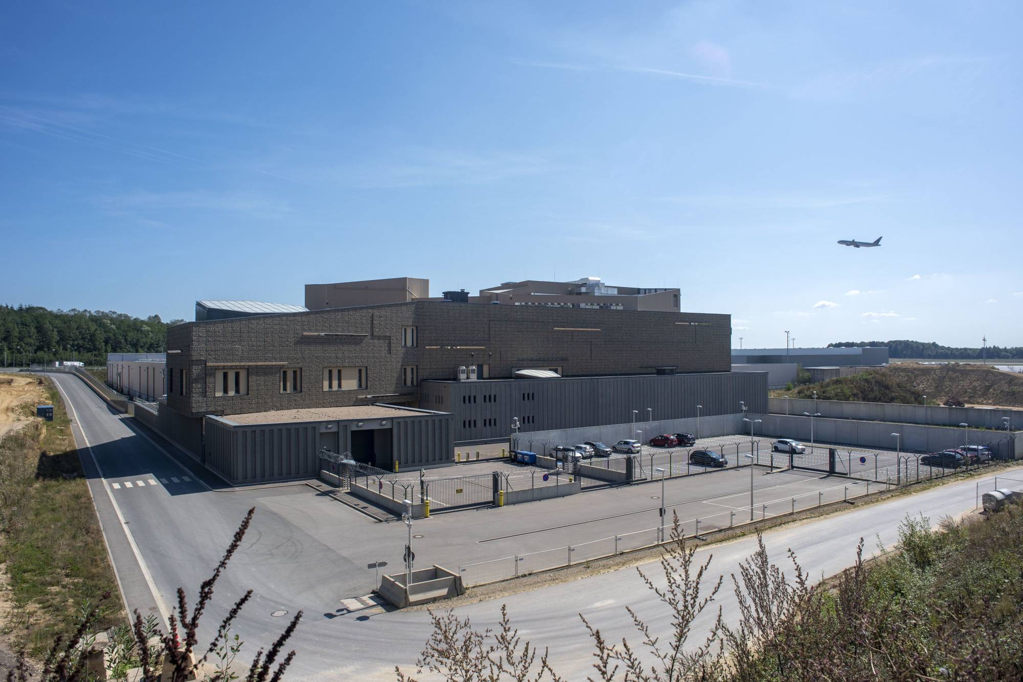 A cargo plane comes in to land at Luxembourg Airport beside the Le Freeport tax-free storage complex in Luxembourg in August 2019. | BLOOMBERG