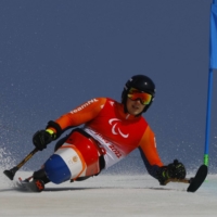Jeroen Kampschreur of the Netherlands competes in the men\'s Giant Slalom Sitting event at the Beijing 2022 Winter Paralympic Games on Thursday. | REUTERS