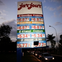 Research on past oil shocks offers a sense of what to expect. Even as gas prices rise, fuel consumption and driving tend to remain steady, partly out of necessity, as well as choice. | REUTERS