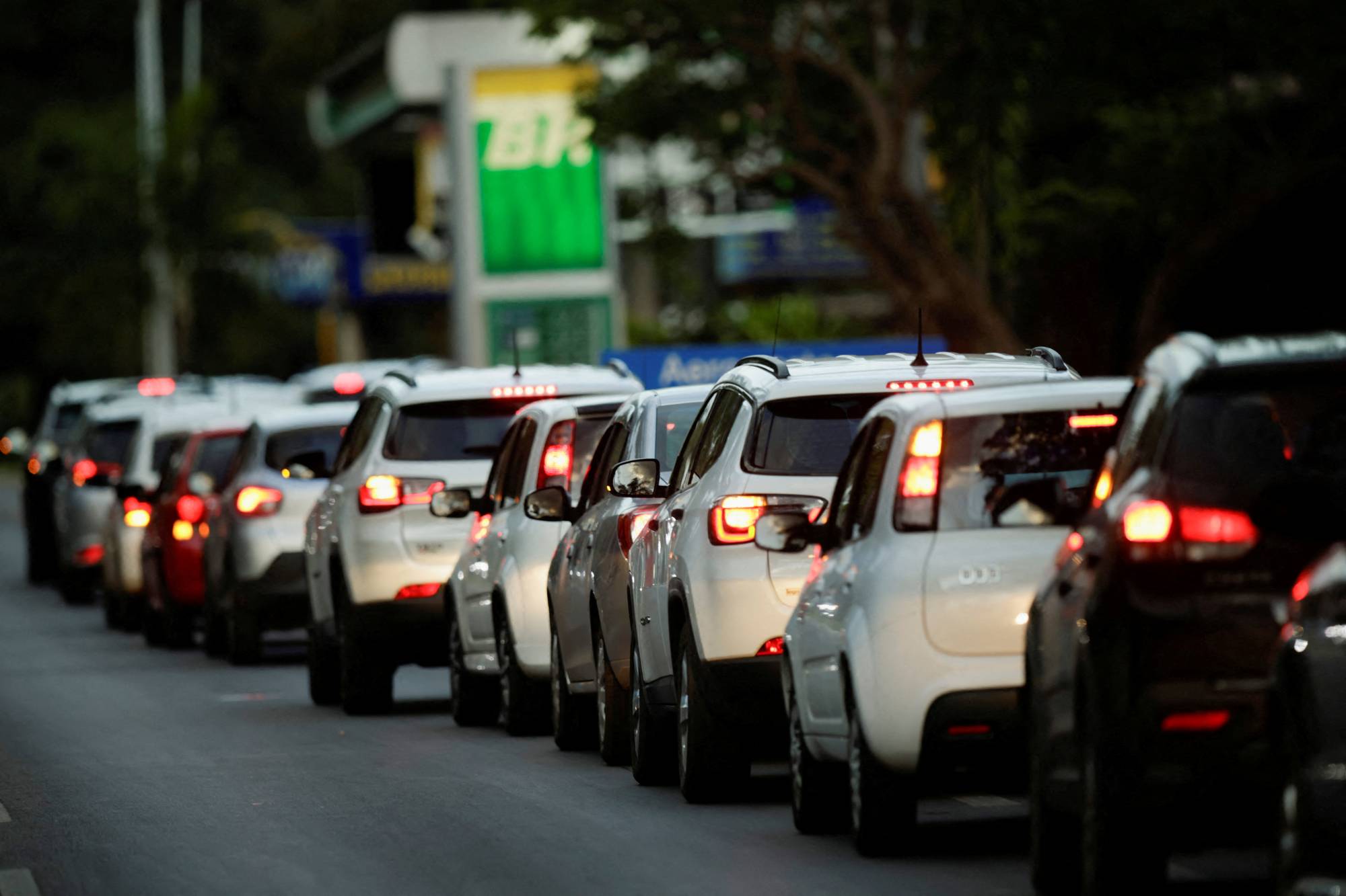 Drivers queue up outside a gas station in Brasilia on Thursday. | Reuters