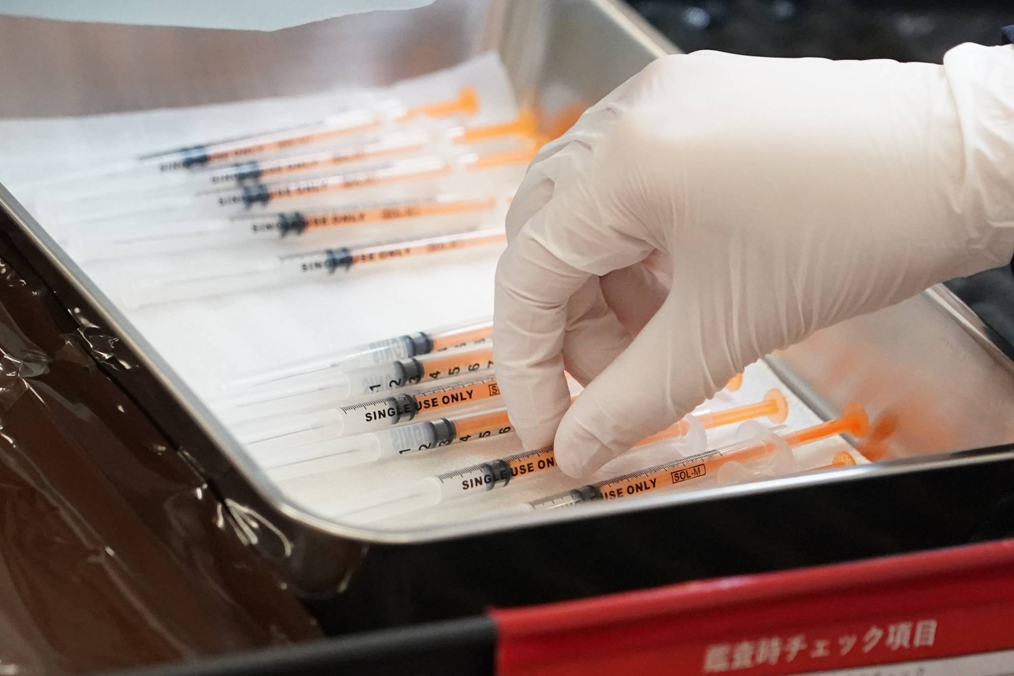 Health minister Shigeyuki Goto said Friday that Japan will make a decision on fourth COVID-19 vaccine doses based on scientific evidence and how other countries are responding. | BLOOMBERG
