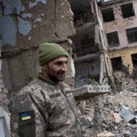 Military personnel at a barracks used by Ukrainian airborne troops  in Mykolaiv, Ukraine, on March 8. The site was attacked by Russian forces the day before. 
 | TYLER HICKS / THE NEW YORK TIMES